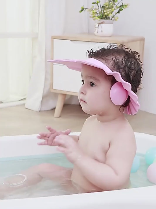 Bonnet souple réglable pour douche de bébé